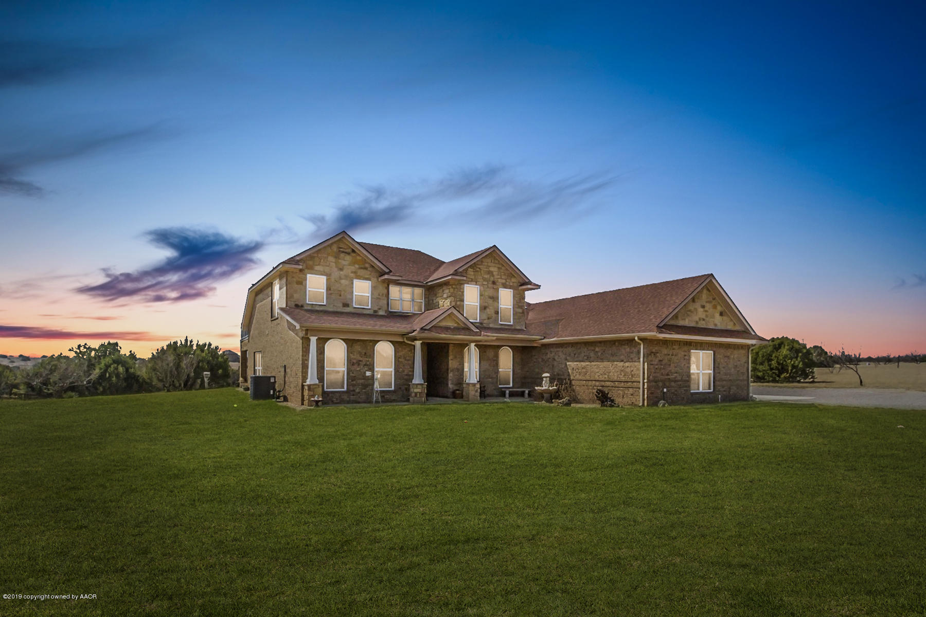 305 Mourning Dove Road Canyon, TX 79015 - Photo 1 of 65 a front view of a house with garden