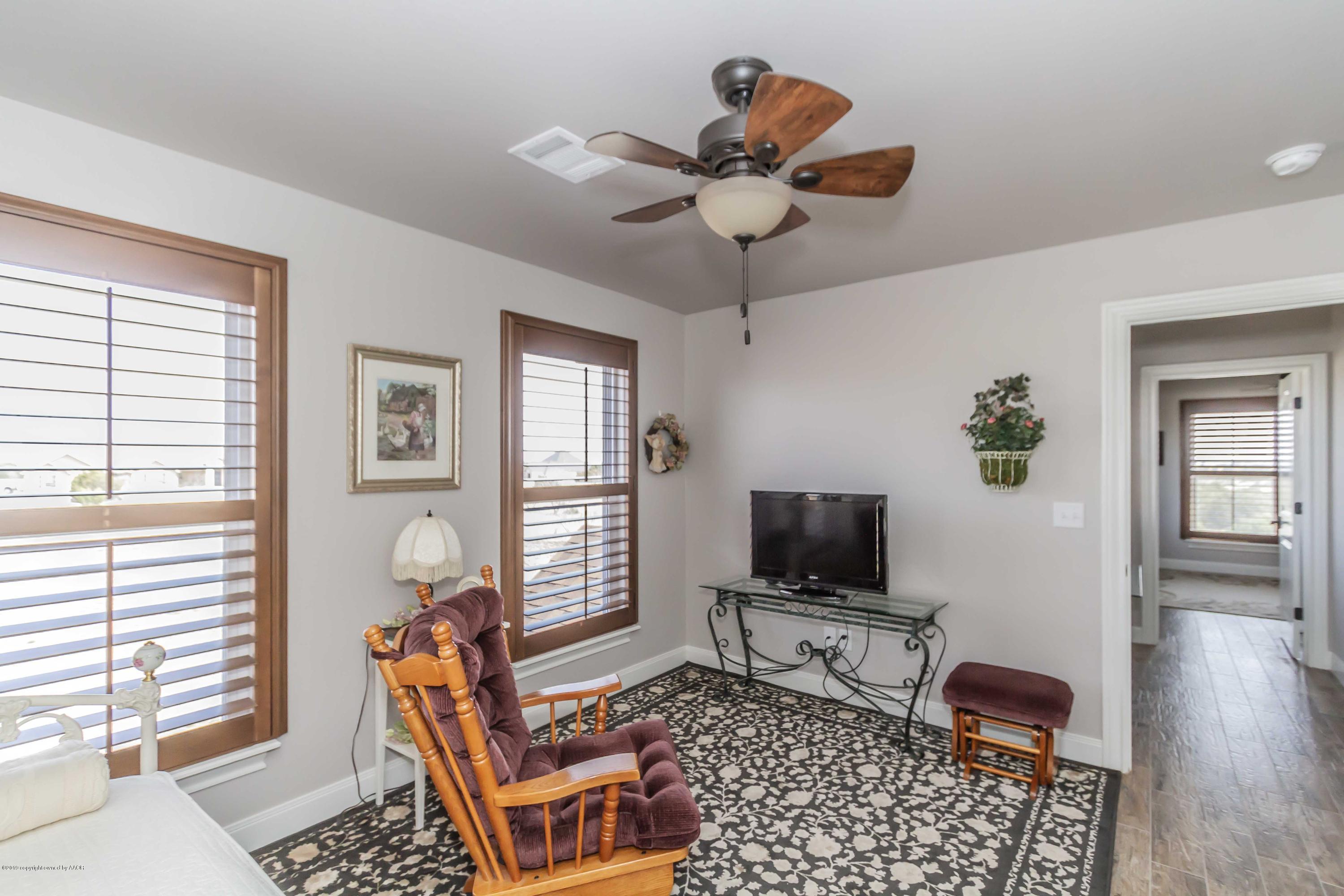 305 Mourning Dove Road Canyon, TX 79015 - Photo 45 of 65 a living room with furniture and a flat screen tv