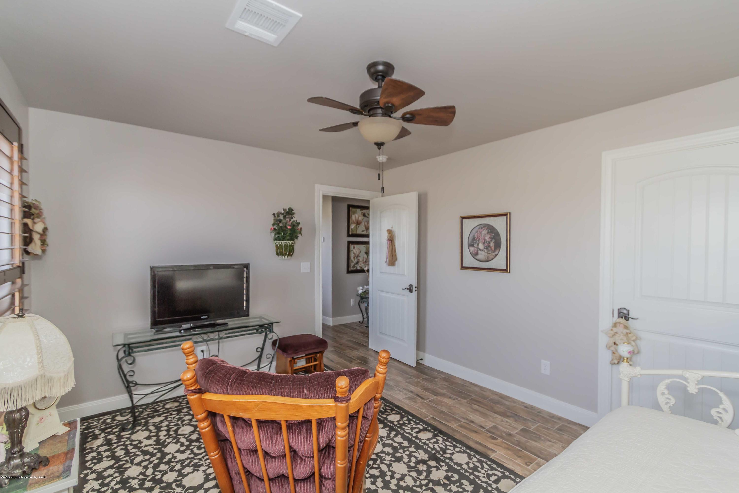305 Mourning Dove Road Canyon, TX 79015 - Photo 46 of 65 a living room with furniture and a flat screen tv