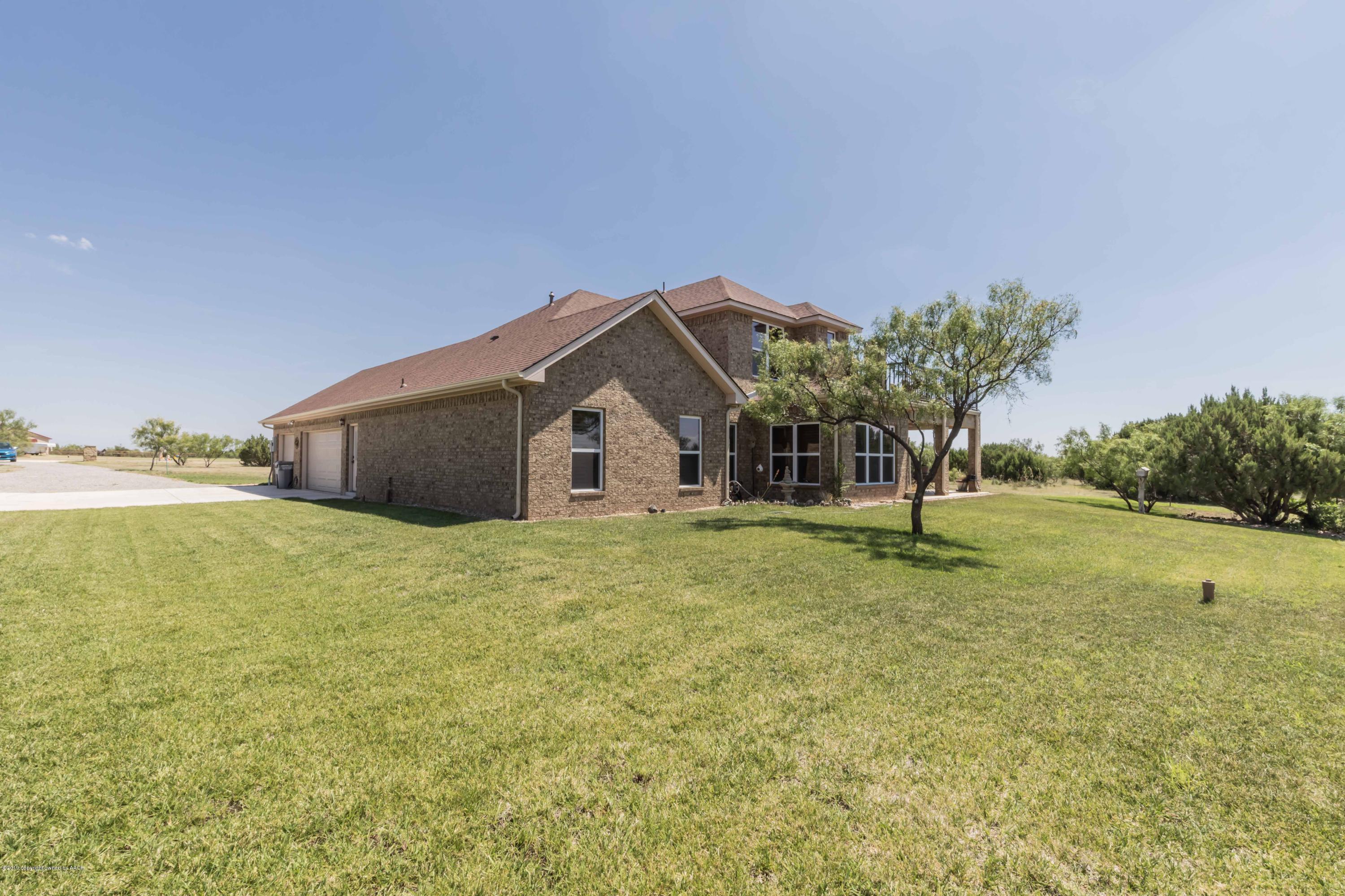 305 Mourning Dove Road Canyon, TX 79015 - Photo 6 of 65 a house view with a garden space