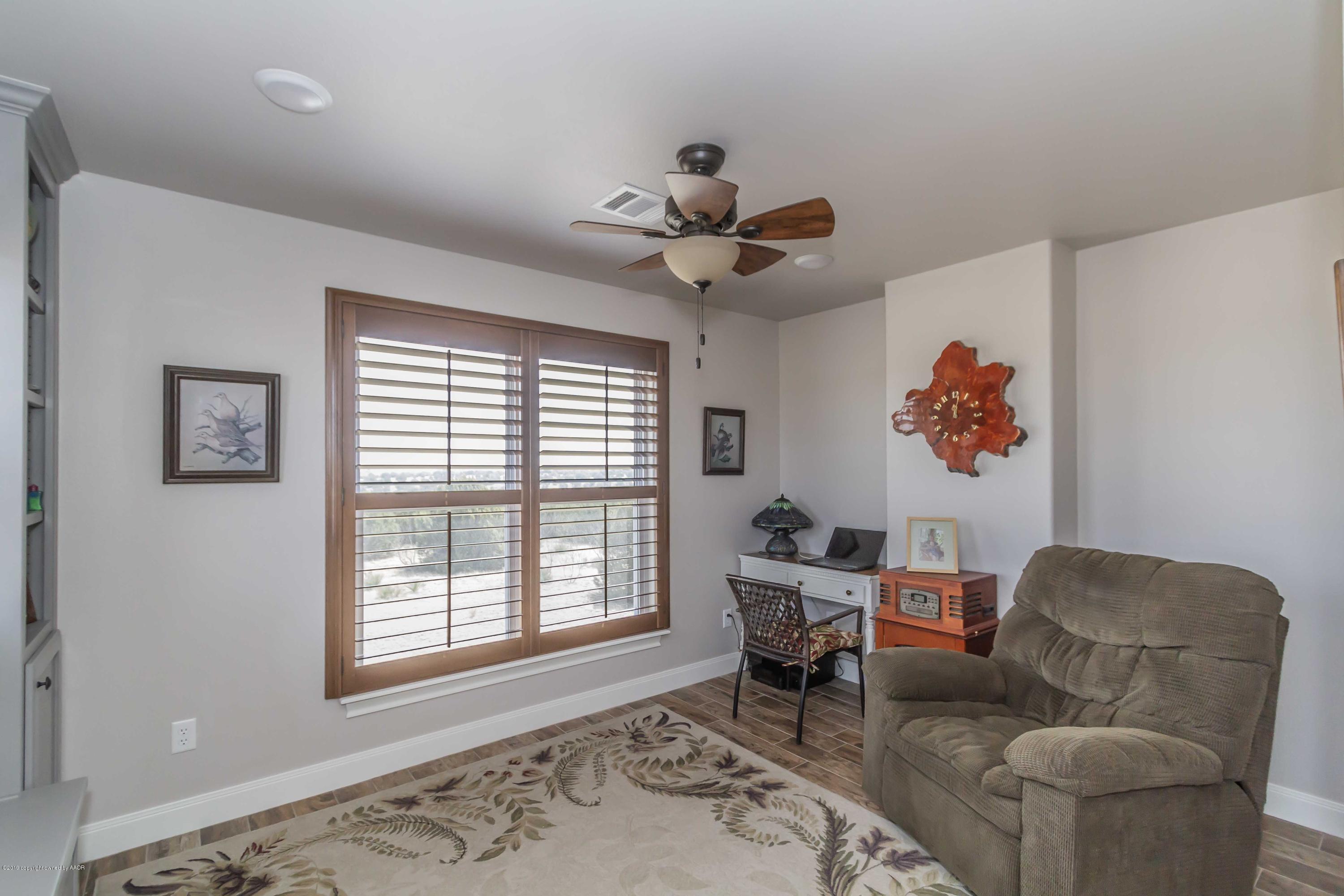 305 Mourning Dove Road Canyon, TX 79015 - Photo 54 of 65 a living room with furniture and a window