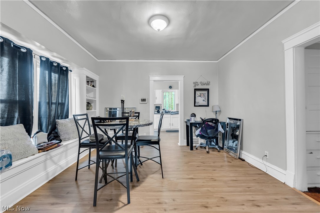 975 Yellowstone Road Cleveland Heights, OH 44121 - Photo 6 of 19 Dining room featuring wood-type flooring and ornamental molding