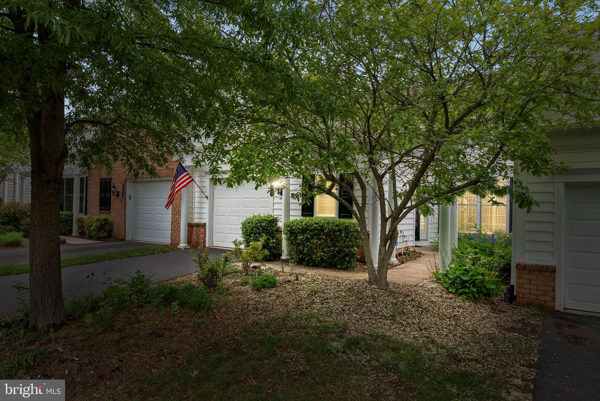 44424 Sunset Maple Drive Ashburn, VA 20147 - Photo 1 of 63 a view of a house with a yard