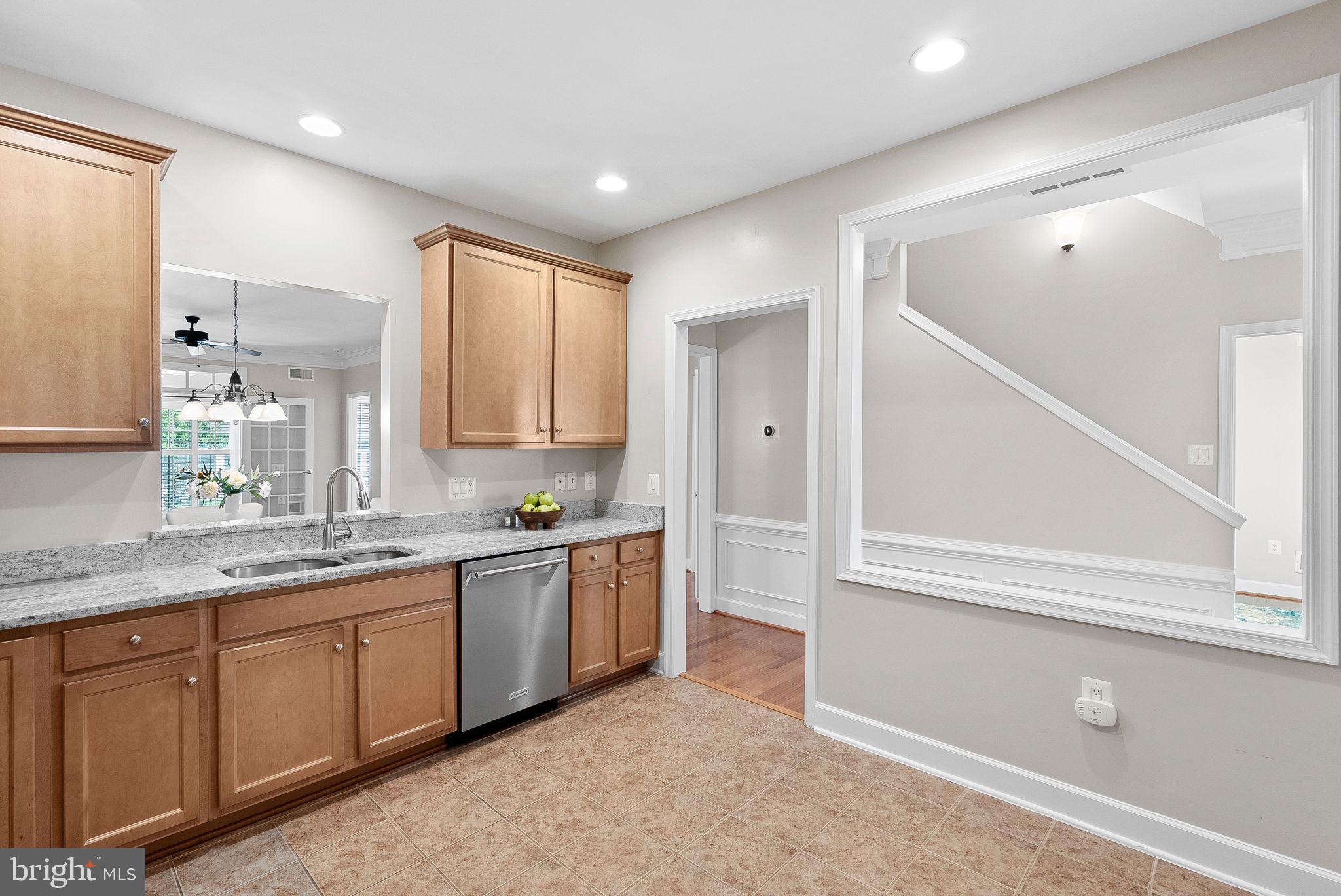 44424 Sunset Maple Drive Ashburn, VA 20147 - Photo 11 of 63 a large bathroom with double vanity and a mirror