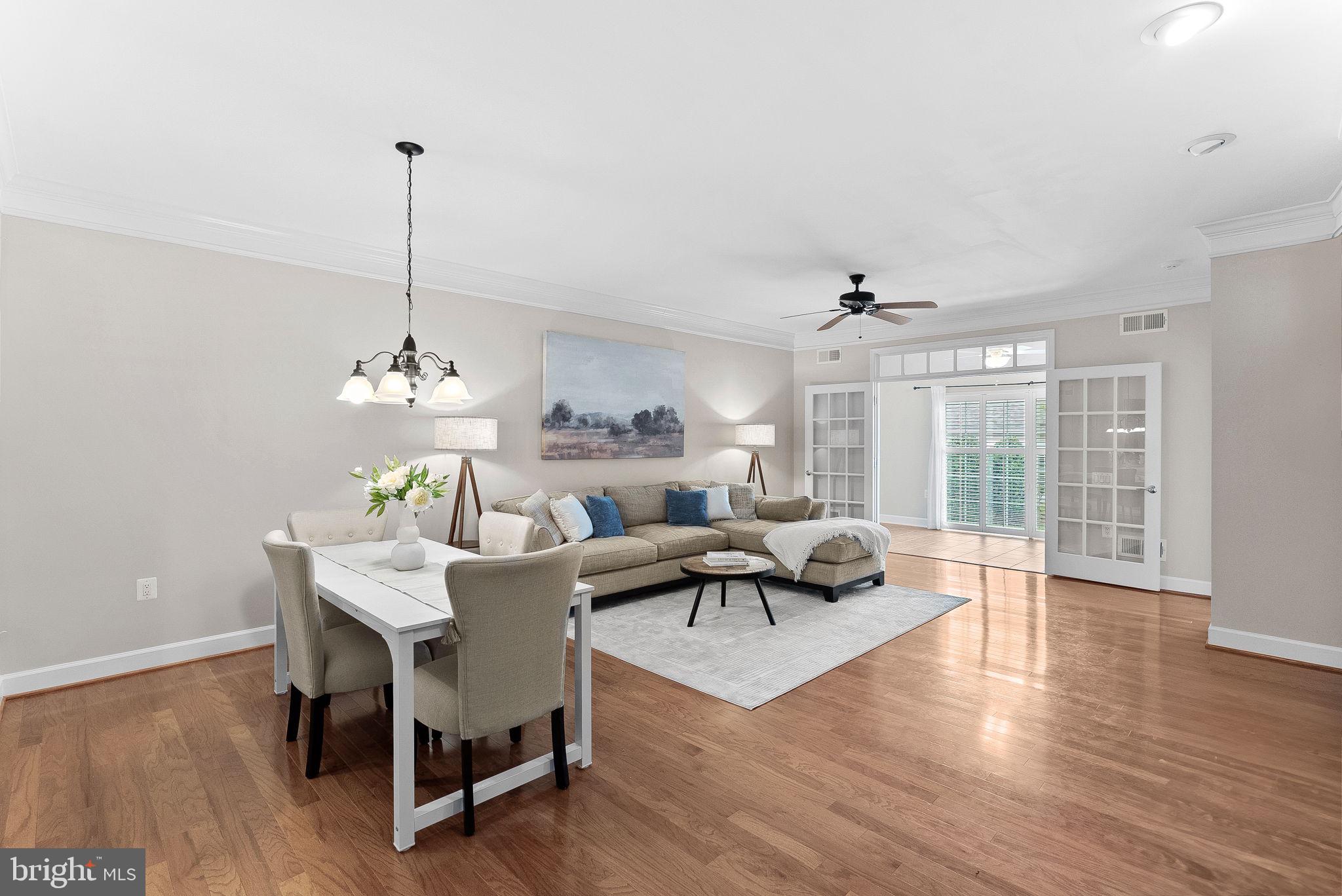 44424 Sunset Maple Drive Ashburn, VA 20147 - Photo 18 of 63 a living room with furniture and wooden floor