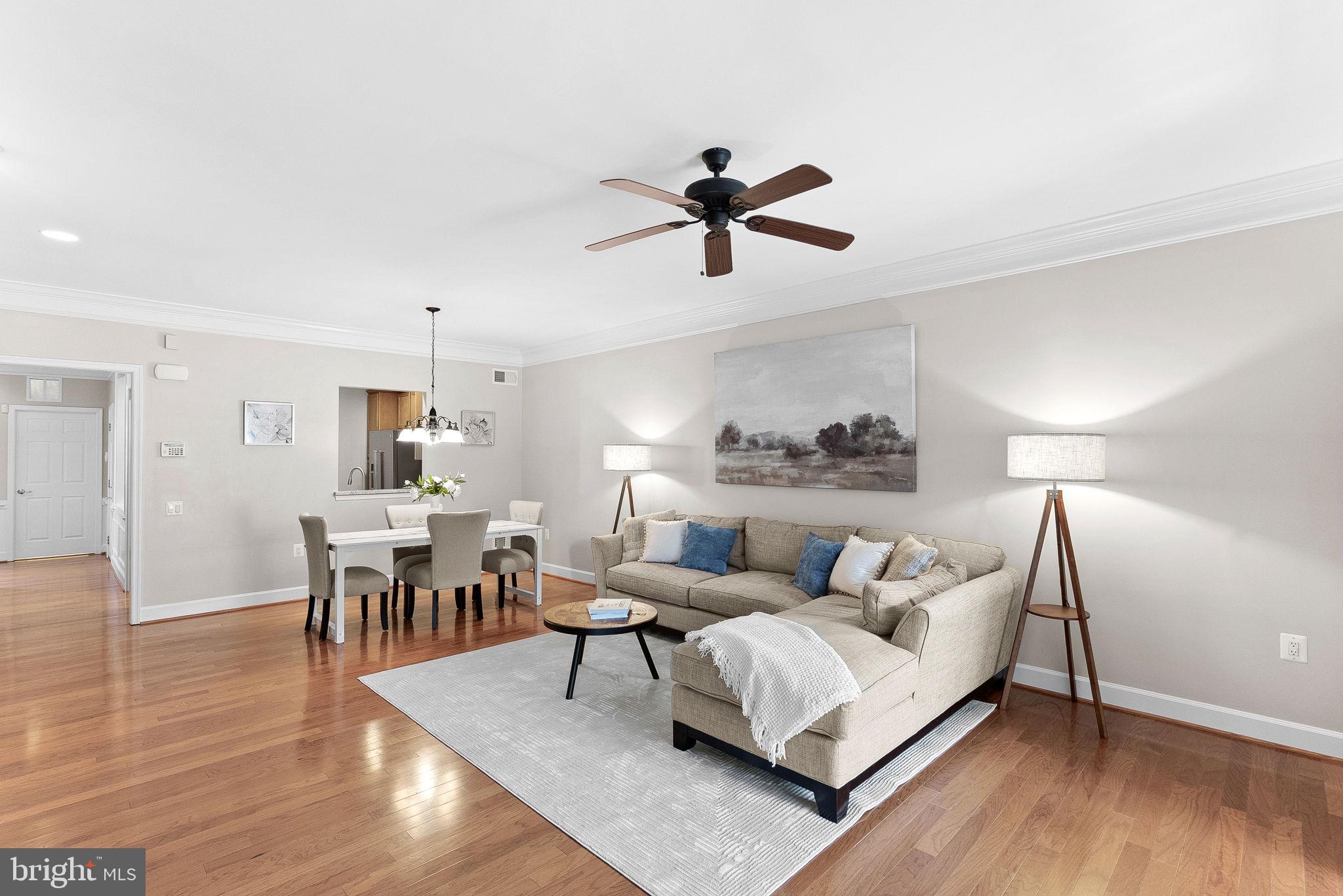 44424 Sunset Maple Drive Ashburn, VA 20147 - Photo 20 of 63 a living room with furniture and a wooden floor