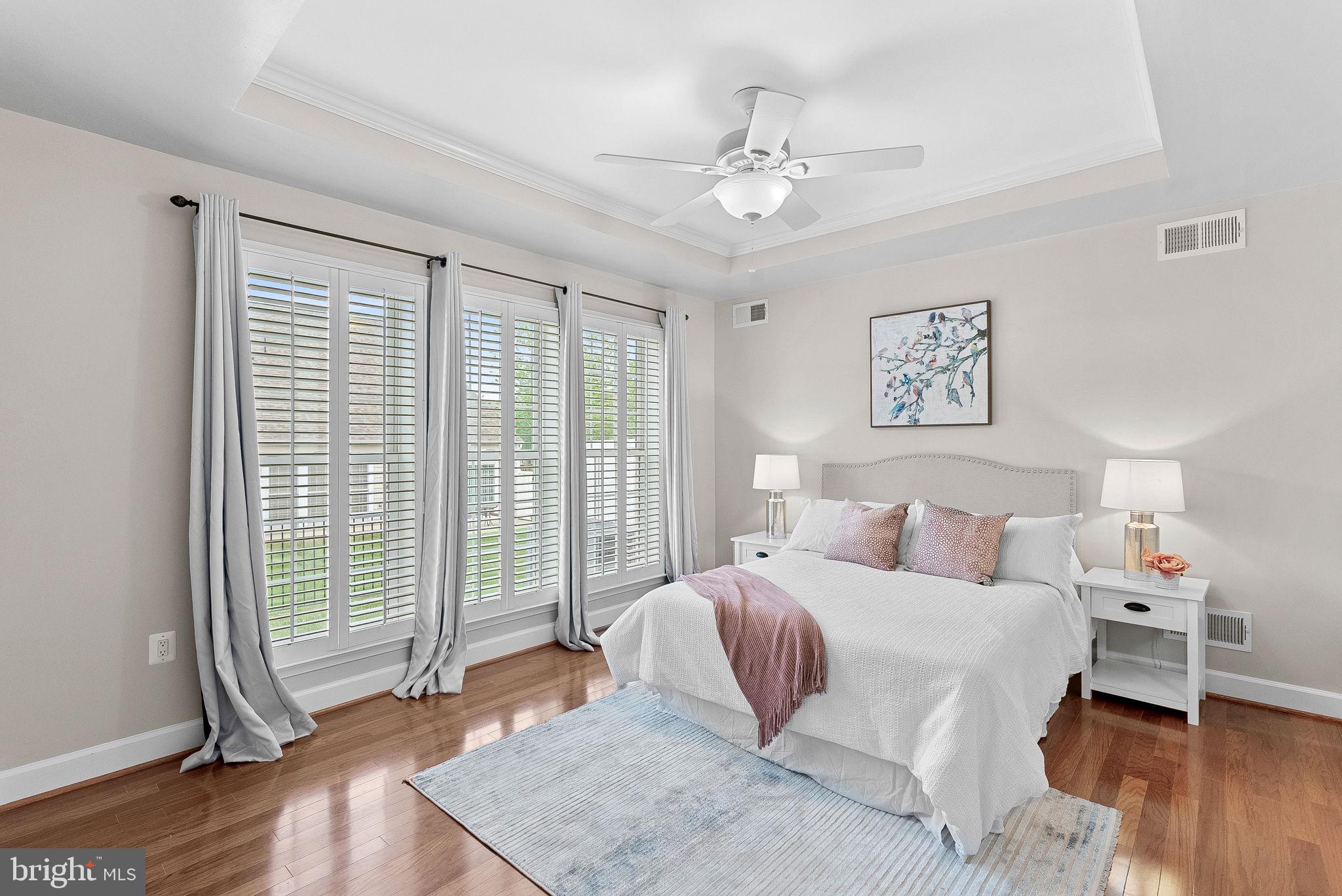 44424 Sunset Maple Drive Ashburn, VA 20147 - Photo 26 of 63 a bedroom with a large bed and a window