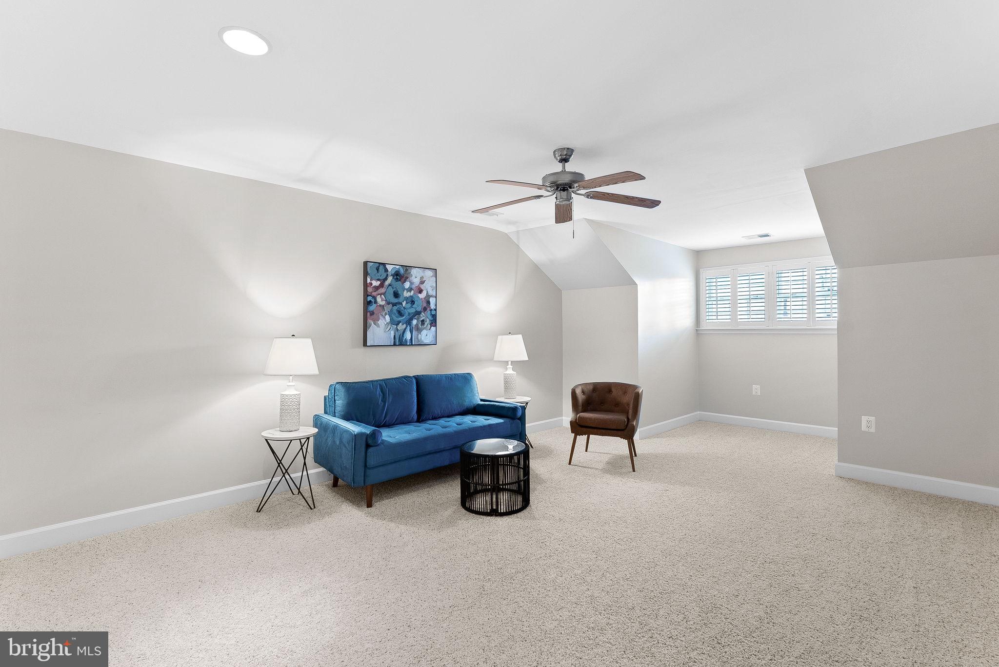 44424 Sunset Maple Drive Ashburn, VA 20147 - Photo 39 of 63 a living room with furniture and a window