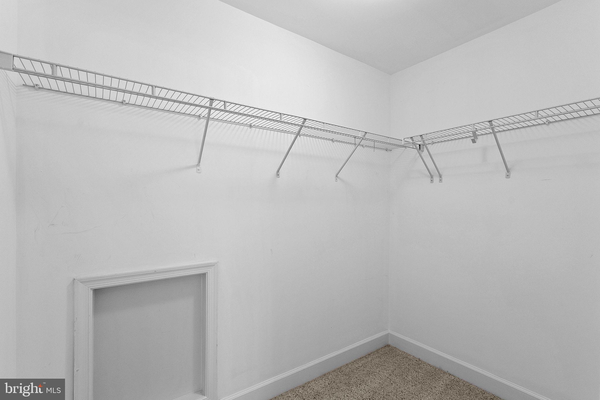 44424 Sunset Maple Drive Ashburn, VA 20147 - Photo 40 of 63 a view of a room with racks on the wall