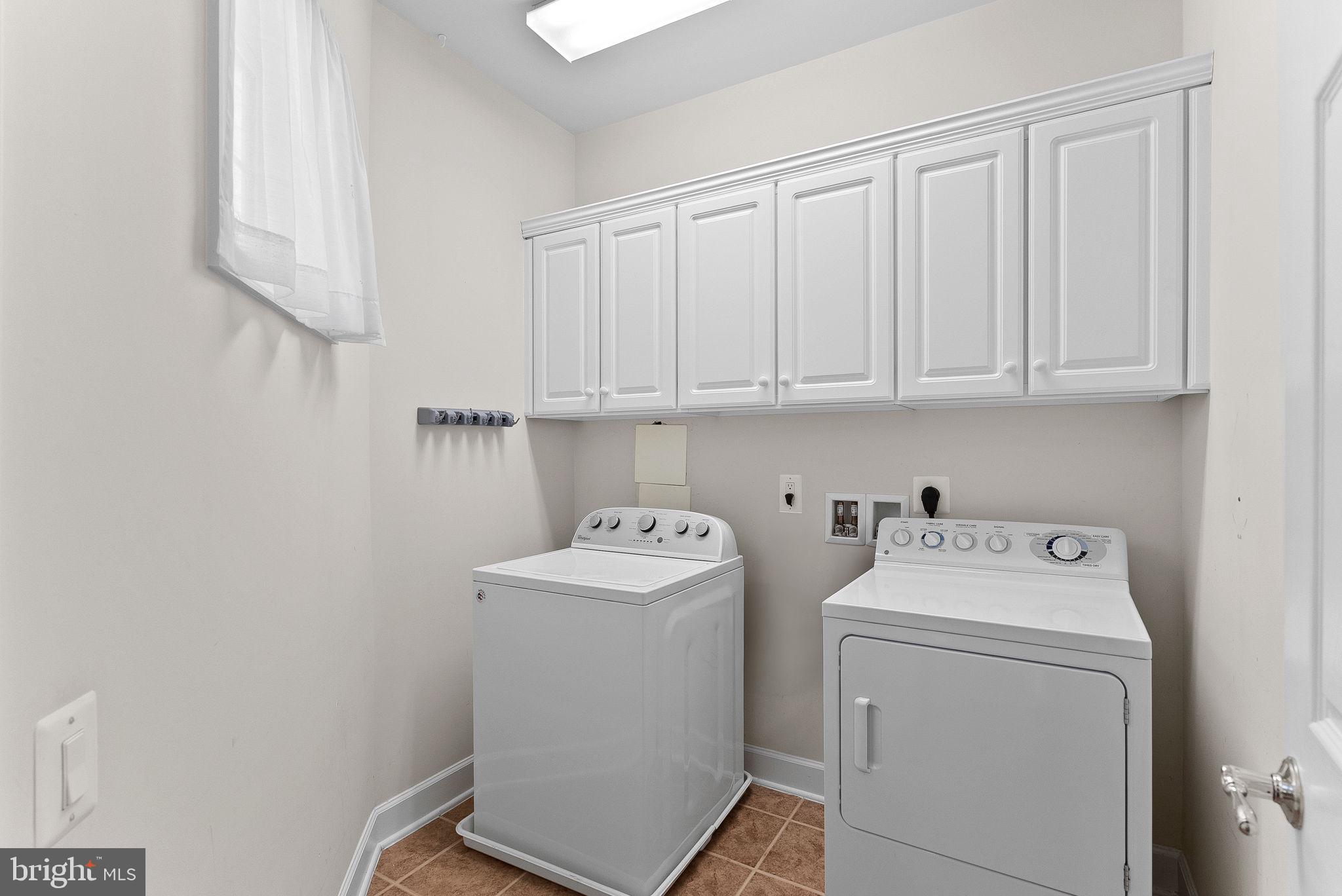 44424 Sunset Maple Drive Ashburn, VA 20147 - Photo 45 of 63 a utility room with dryer and washer
