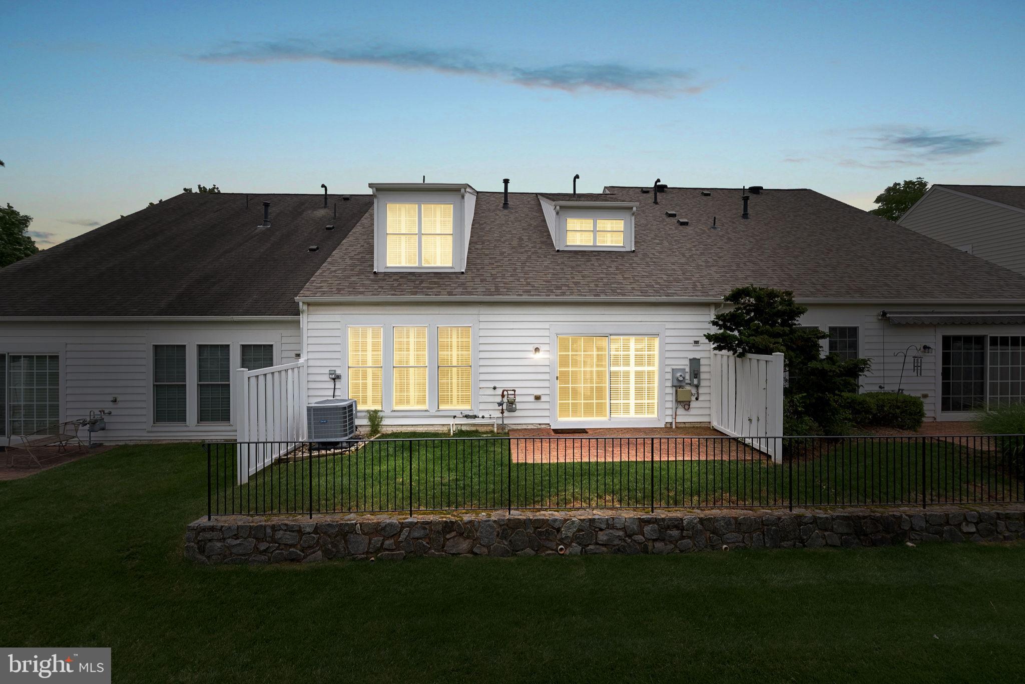 44424 Sunset Maple Drive Ashburn, VA 20147 - Photo 46 of 63 a front view of a house with a yard