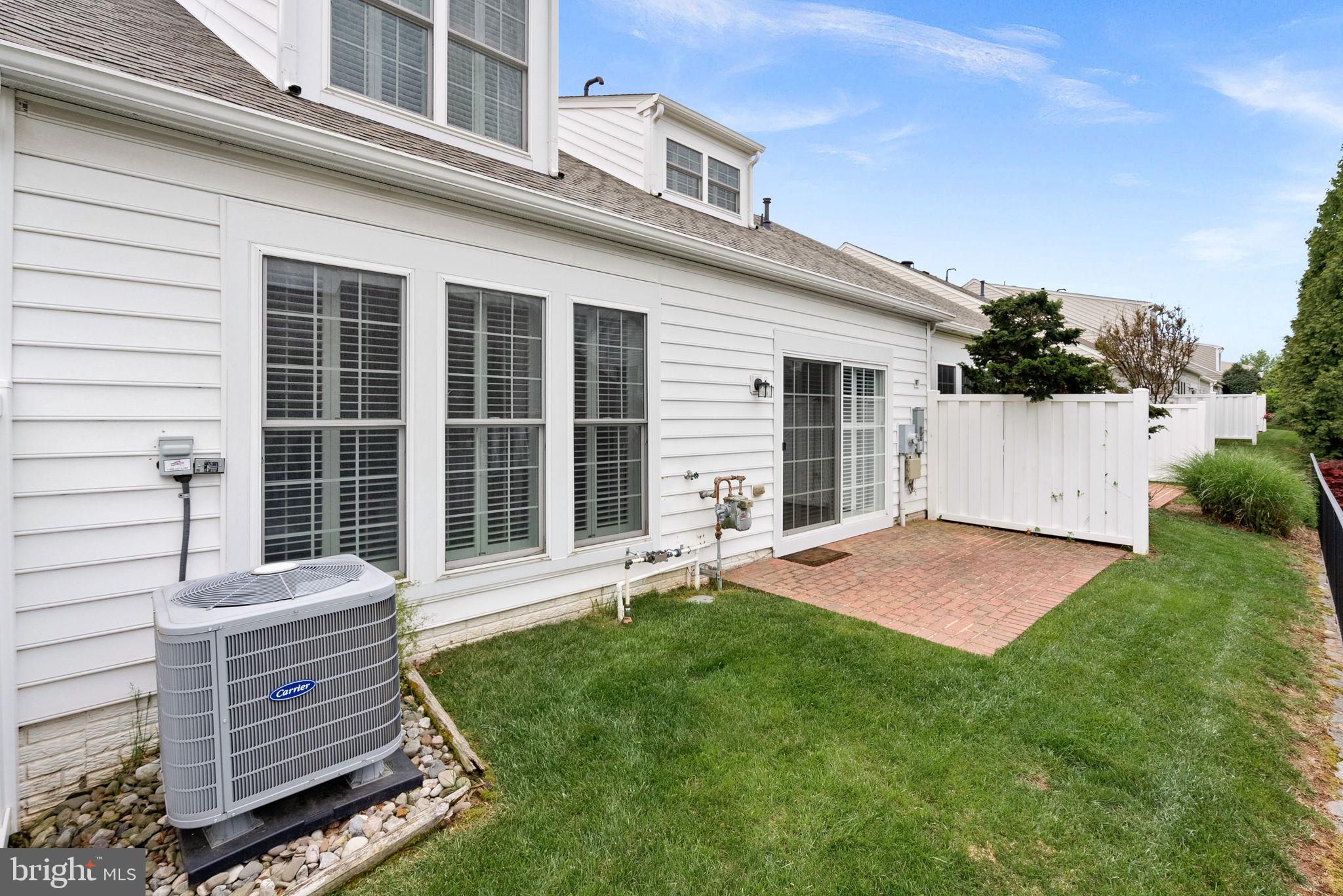 44424 Sunset Maple Drive Ashburn, VA 20147 - Photo 48 of 63 a front view of a house with a yard