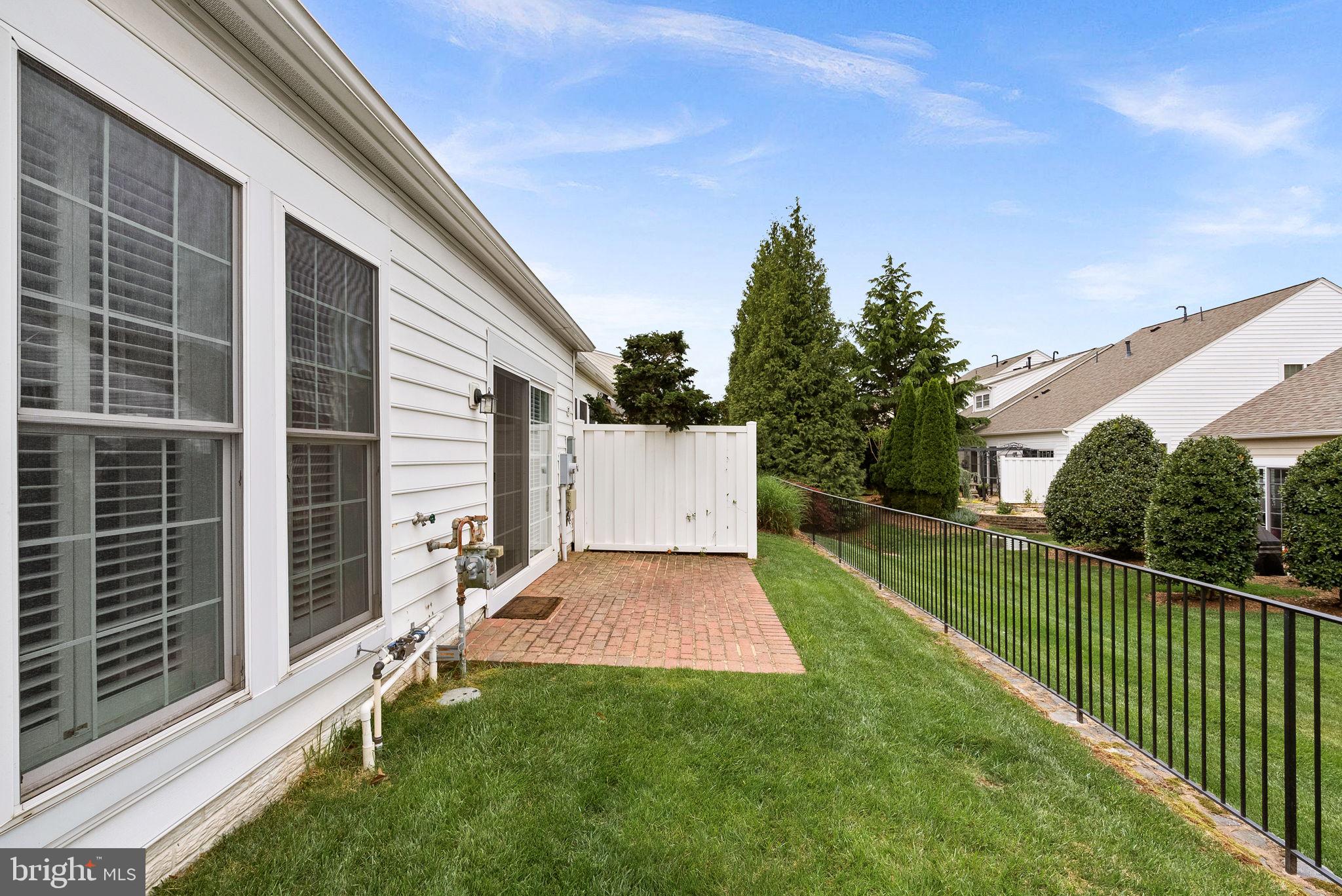 44424 Sunset Maple Drive Ashburn, VA 20147 - Photo 49 of 63 a view of a house with backyard and garden