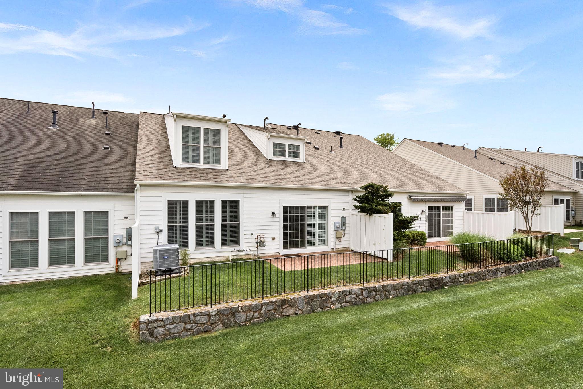 44424 Sunset Maple Drive Ashburn, VA 20147 - Photo 50 of 63 front view of a house with a yard
