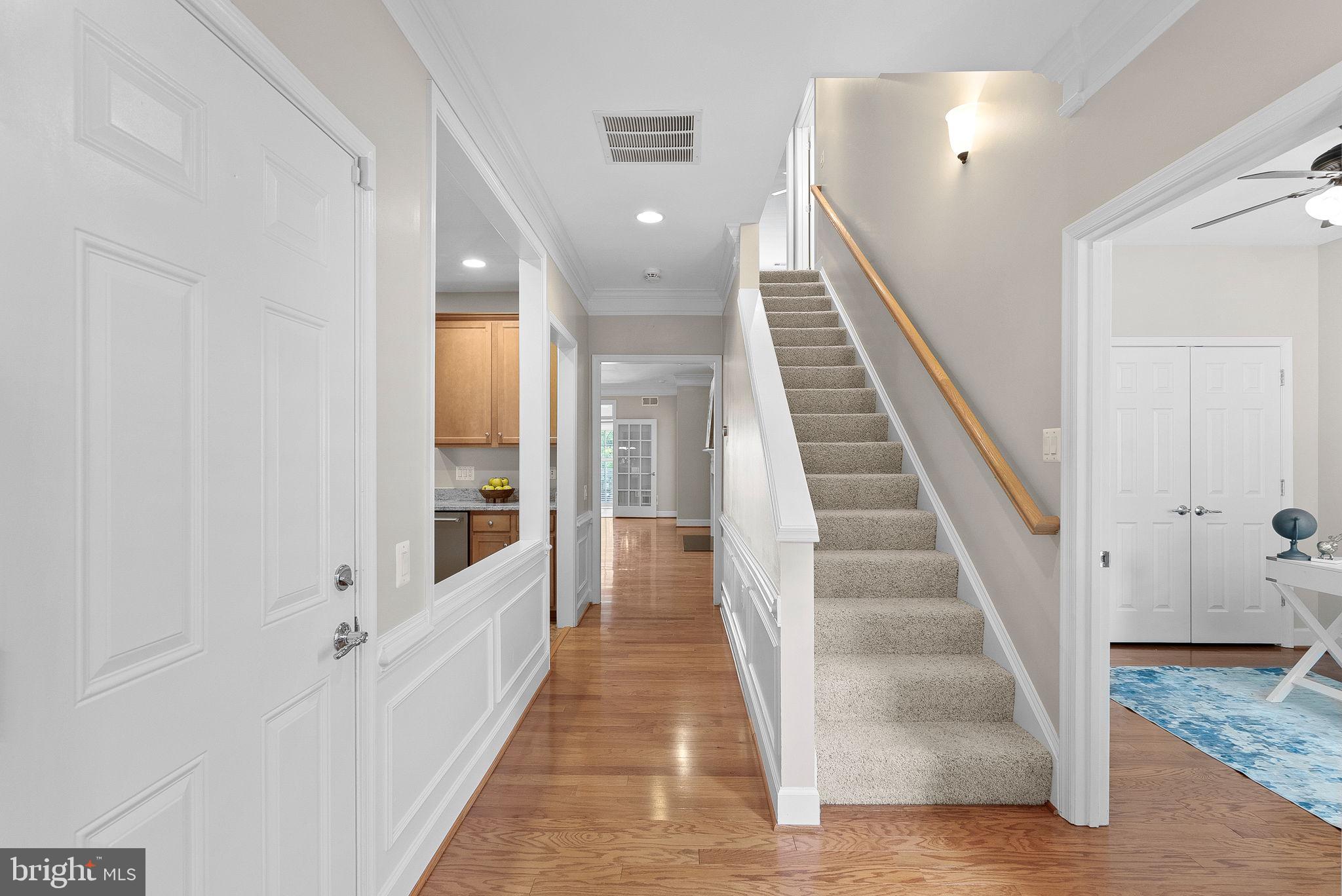 44424 Sunset Maple Drive Ashburn, VA 20147 - Photo 10 of 63 a view of a hallway with staircase