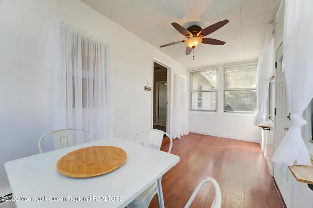 a blue and white vase sitting on a table