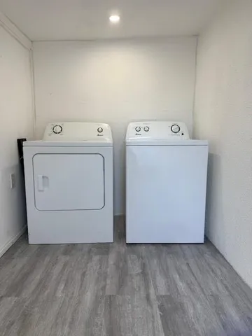 a utility room with dryer and washer