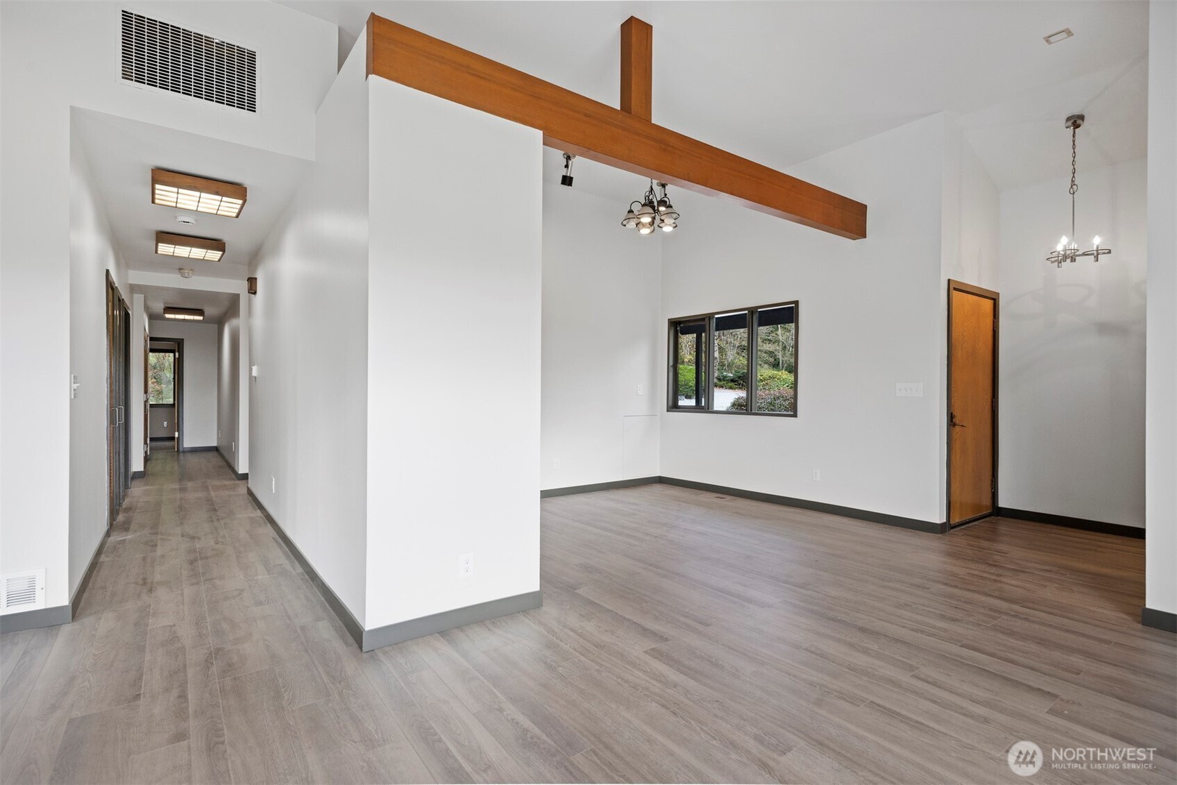 18928 Bow Hill Road Burlington, WA 98233 - Photo 9 of 39 a view of a hallway with wooden floor