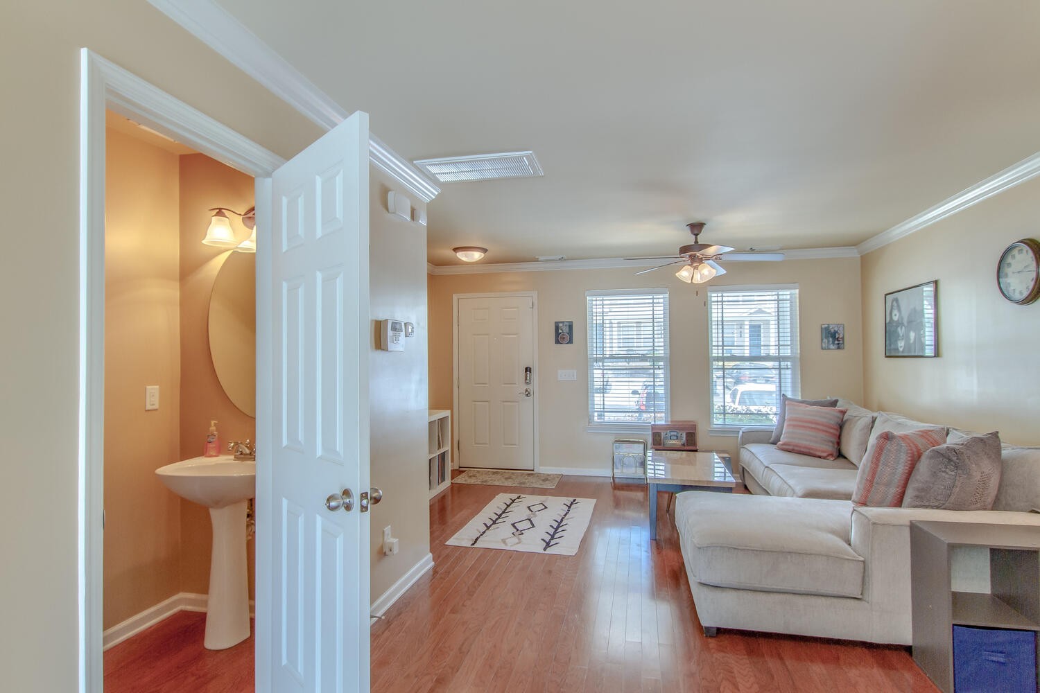 1382 Rural Hill Road, Unit 180 Antioch, TN 37013 - Photo 11 of 30 a living room with furniture and a chandelier