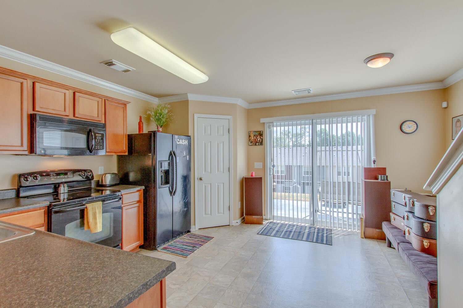 1382 Rural Hill Road, Unit 180 Antioch, TN 37013 - Photo 13 of 30 a kitchen with stainless steel appliances granite countertop a refrigerator oven stove top oven a sink and dishwasher