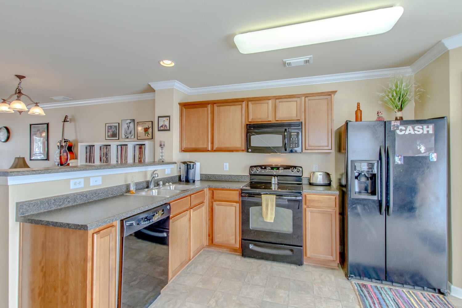 1382 Rural Hill Road, Unit 180 Antioch, TN 37013 - Photo 15 of 30 a kitchen with stainless steel appliances granite countertop a stove a sink dishwasher a refrigerator and a oven