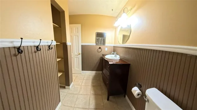 a view of a hallway with seating area