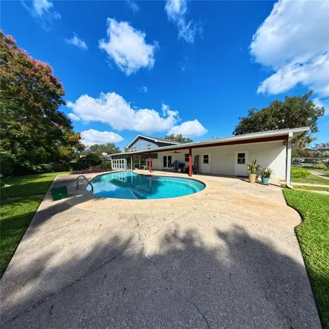 a front view of a house with yard