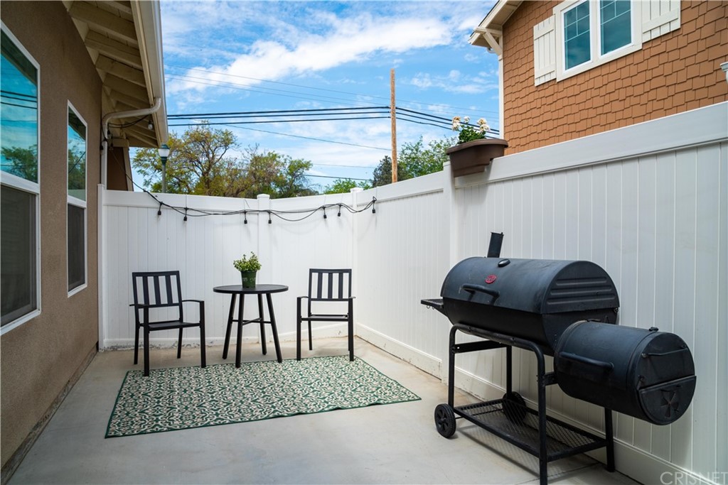 110 Main Street Piru, CA 93040 - Photo 12 of 13 a view of a chairs and a table in the balcony