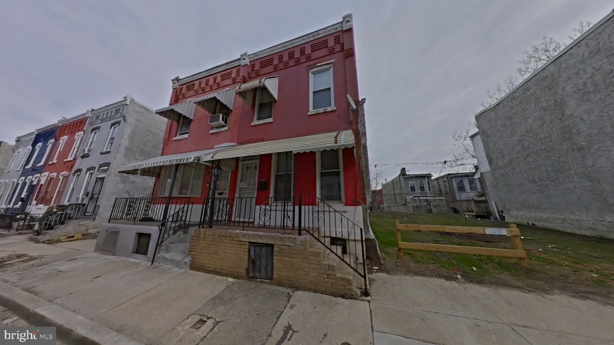 a view of a house with a street