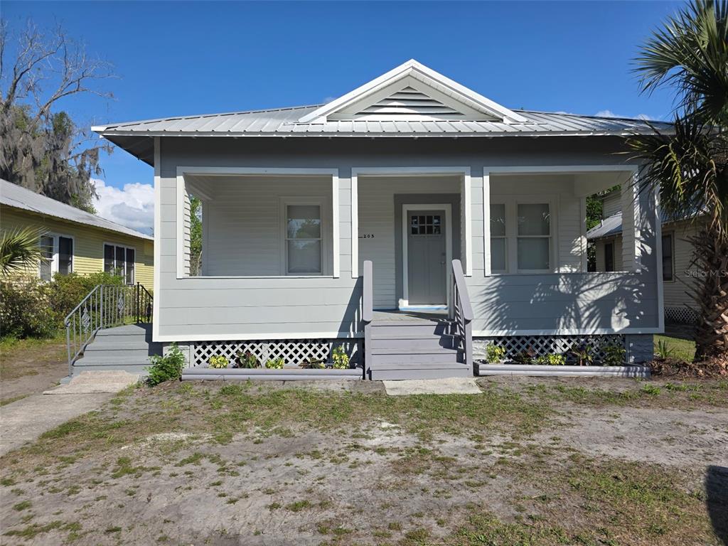 205 South 13th Street Palatka, FL 32177 - Photo 1 of 39 a view of a house with a yard