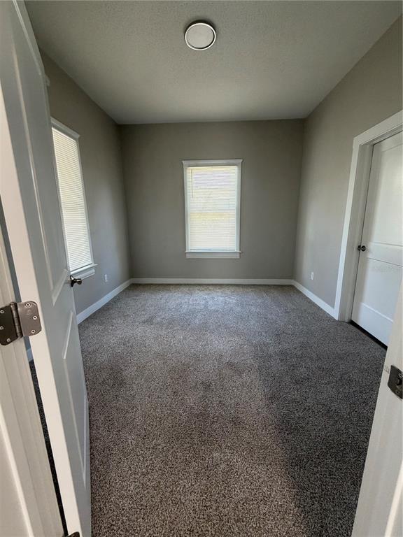 205 South 13th Street Palatka, FL 32177 - Photo 11 of 39 an empty room with a window