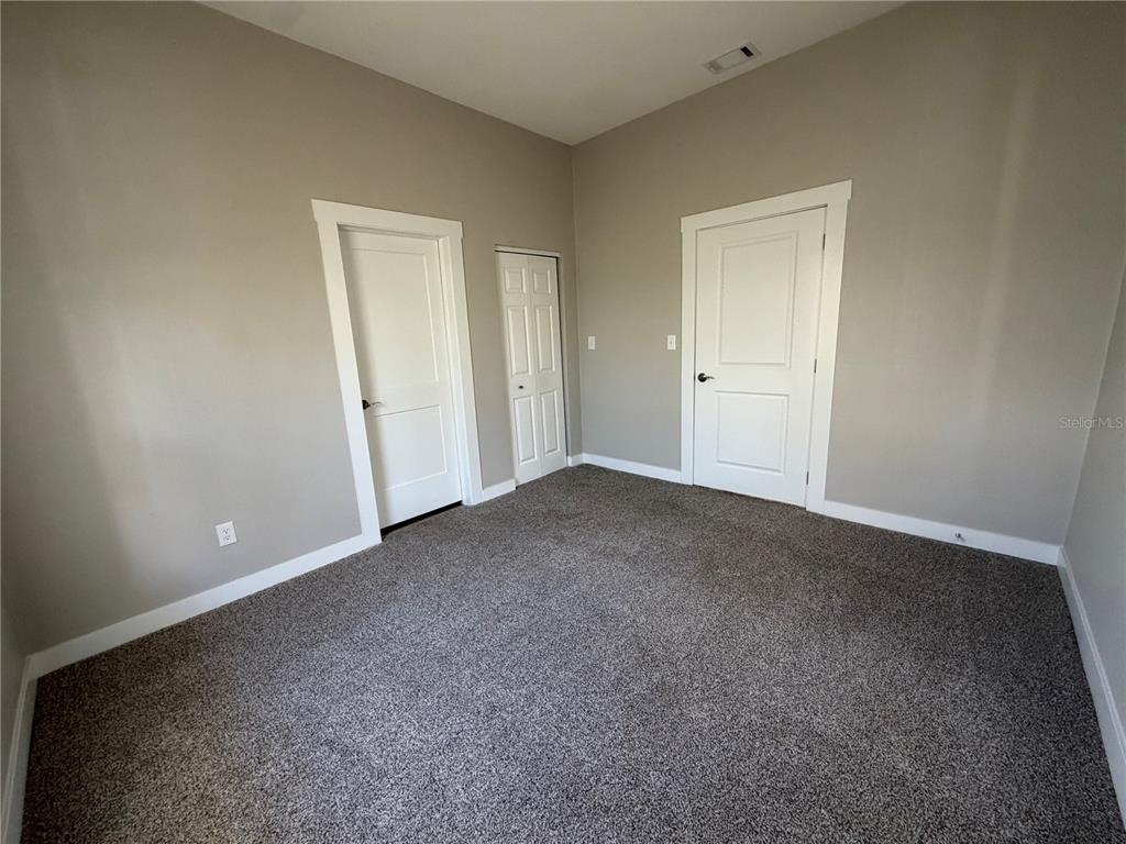 205 South 13th Street Palatka, FL 32177 - Photo 12 of 39 a view of an empty room and closet area