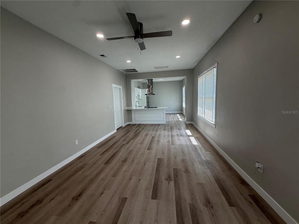 205 South 13th Street Palatka, FL 32177 - Photo 17 of 39 a view of empty room with wooden floor