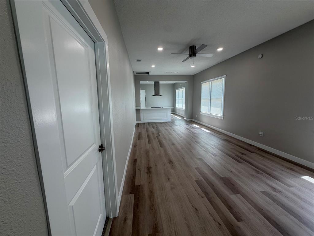 205 South 13th Street Palatka, FL 32177 - Photo 18 of 39 a view of hallway with wooden floor and window
