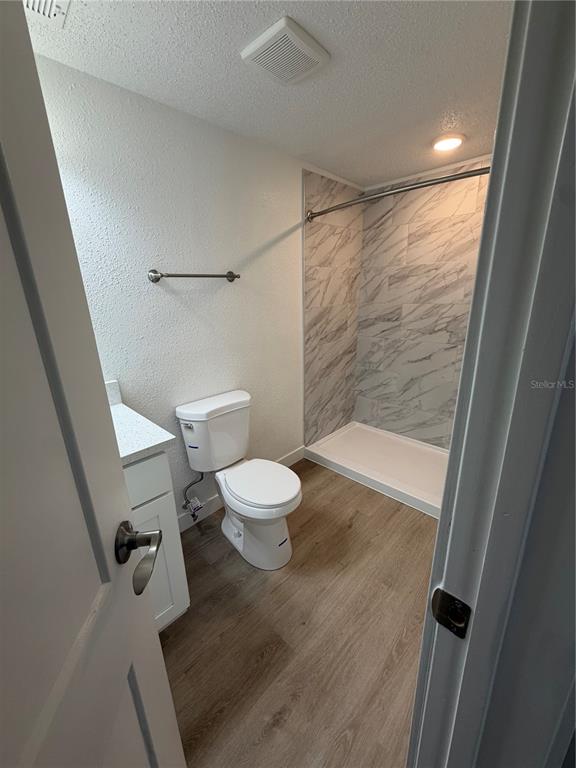 205 South 13th Street Palatka, FL 32177 - Photo 32 of 39 a bathroom with a toilet and a shower