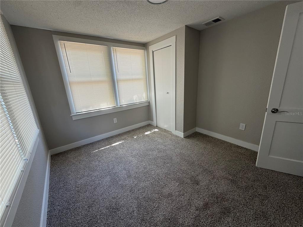 205 South 13th Street Palatka, FL 32177 - Photo 34 of 39 an empty room with windows