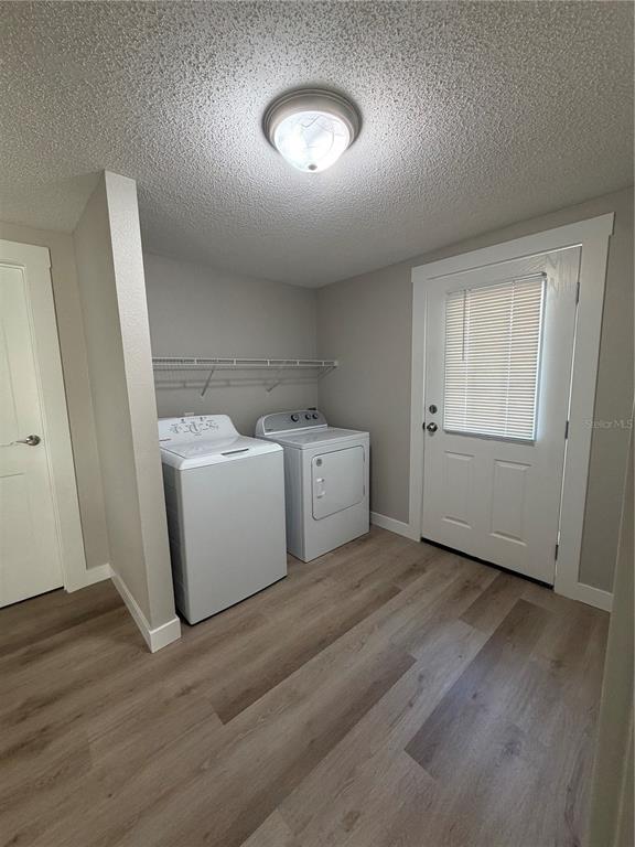 205 South 13th Street Palatka, FL 32177 - Photo 36 of 39 a view of a room with wooden floor and utility room