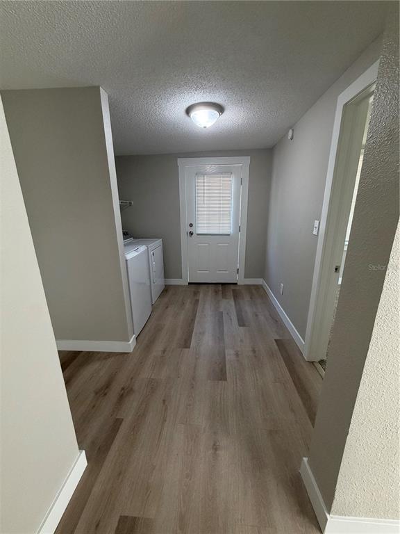 205 South 13th Street Palatka, FL 32177 - Photo 38 of 39 wooden floor in an empty room with a window