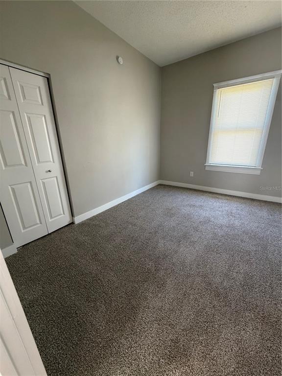 205 South 13th Street Palatka, FL 32177 - Photo 6 of 39 an empty room with a window