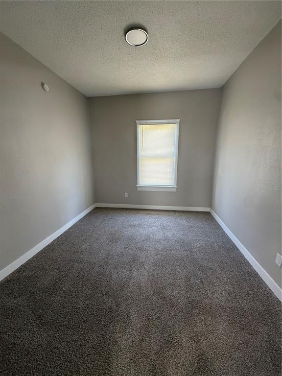 205 South 13th Street Palatka, FL 32177 - Photo 8 of 39 an empty room with a window