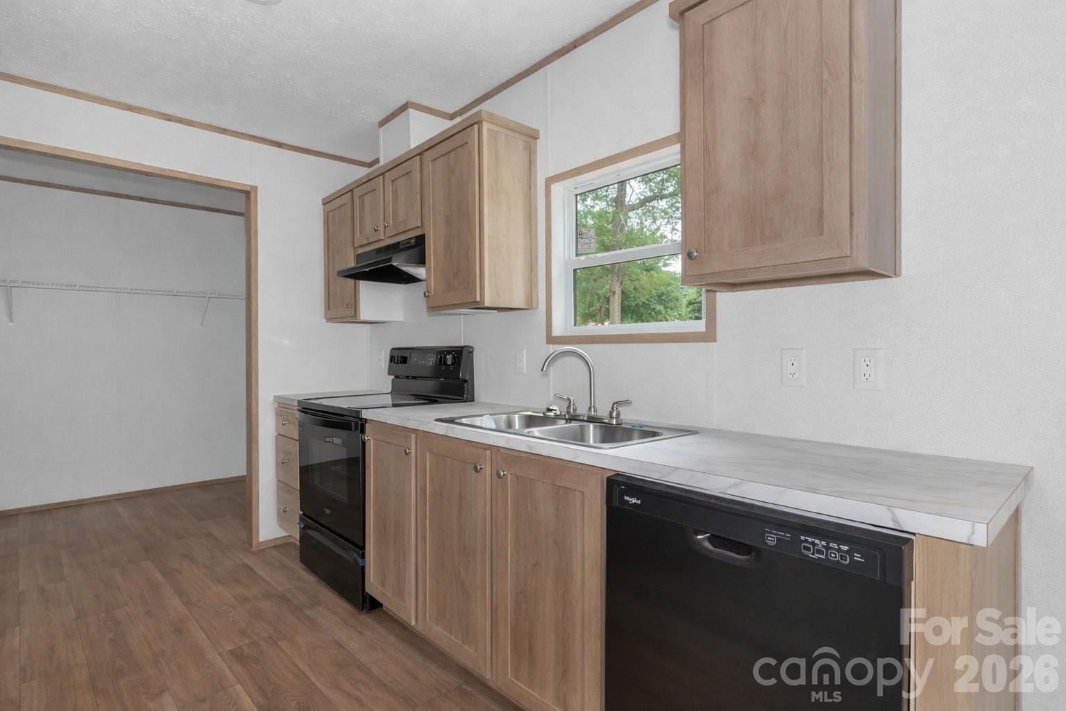 536 Lincolnview Road Lincolnton, NC 28092 - Photo 11 of 32 a kitchen with a sink stove and microwave