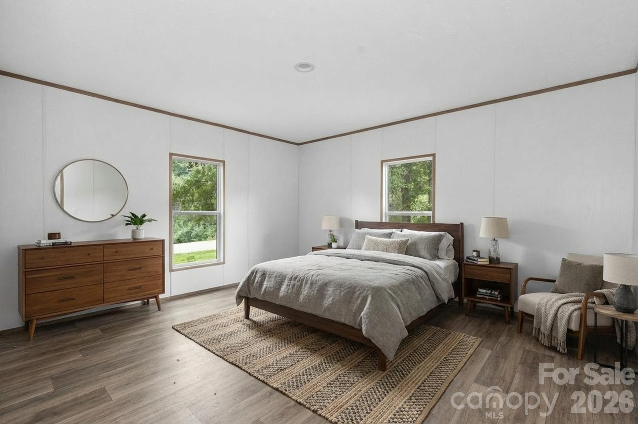 536 Lincolnview Road Lincolnton, NC 28092 - Photo 18 of 32 a bedroom with a bed and a mirror