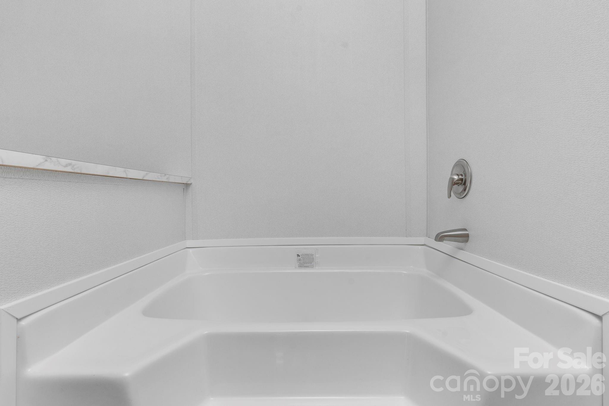 536 Lincolnview Road Lincolnton, NC 28092 - Photo 20 of 32 a close view of a bathtub in bathroom