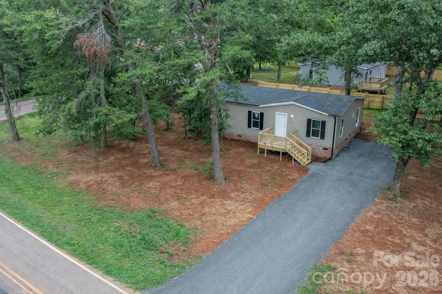 536 Lincolnview Road Lincolnton, NC 28092 - Photo 29 of 32 a view of a house with a yard