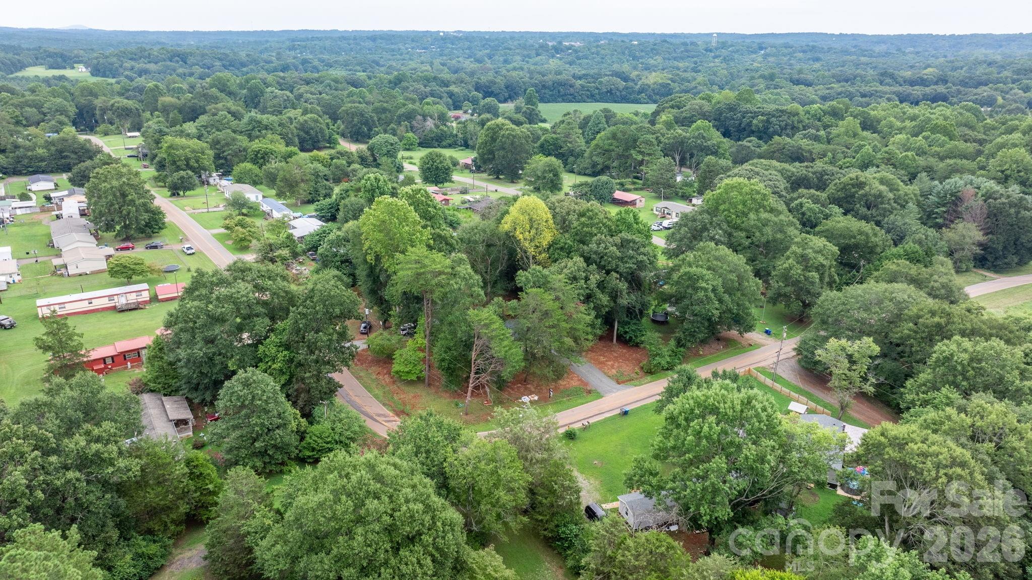 536 Lincolnview Road Lincolnton, NC 28092 - Photo 31 of 32 an aerial view of residential house with outdoor space and trees all around