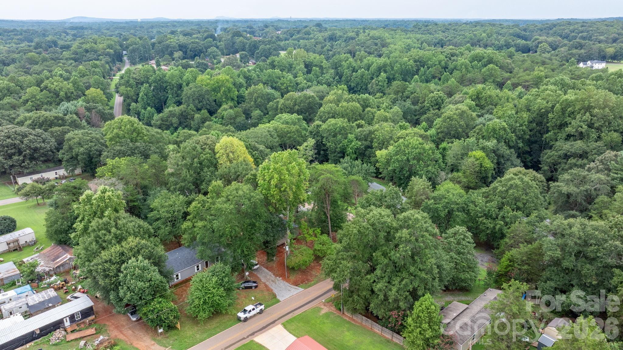 536 Lincolnview Road Lincolnton, NC 28092 - Photo 32 of 32 an aerial view of residential house with outdoor space and trees all around