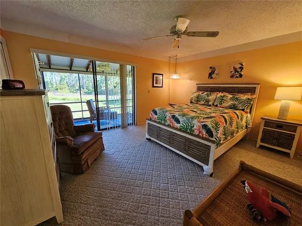 a bed room with a bed and a couch