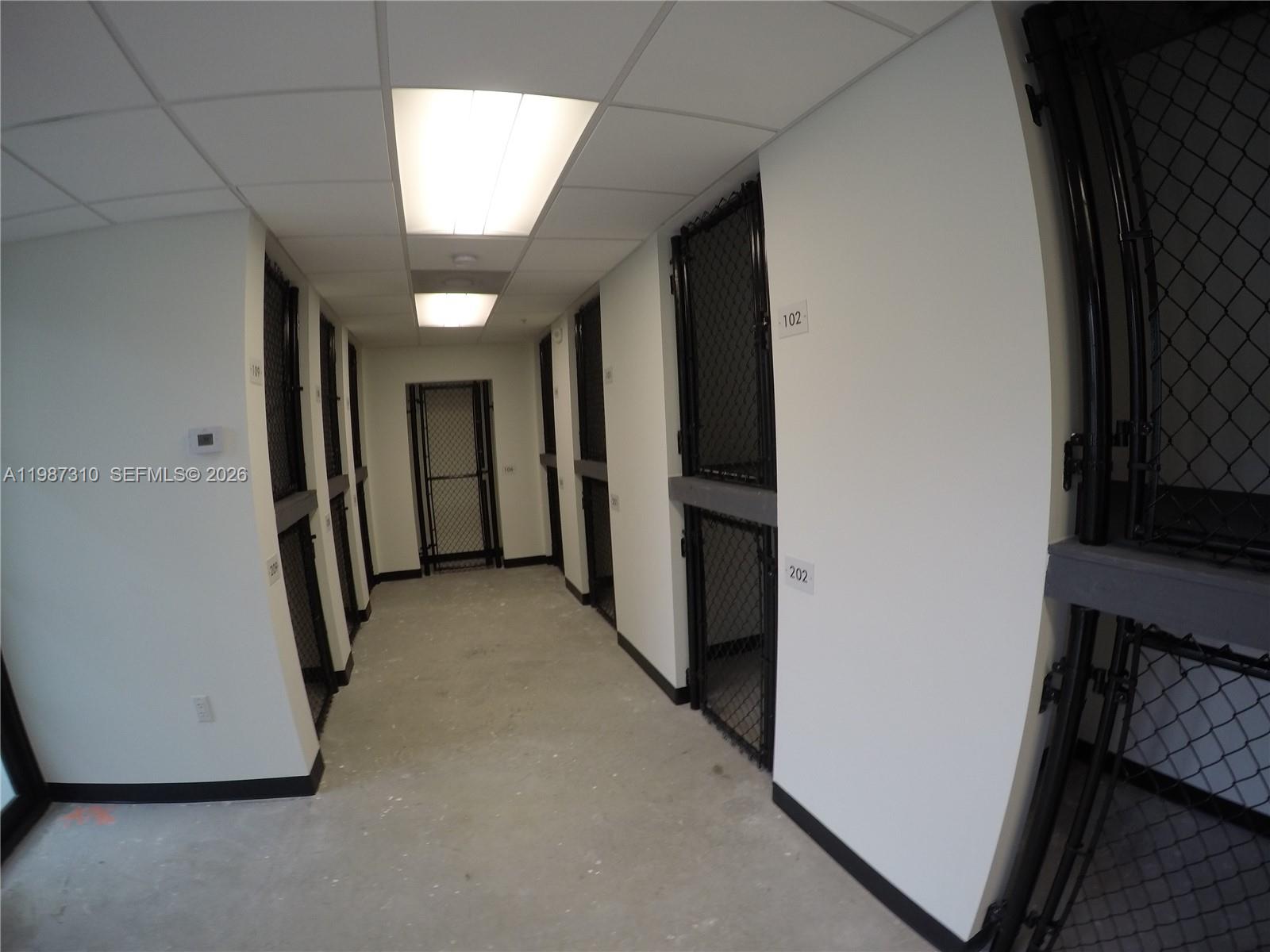 4100 Southwest 64th Avenue, Unit 409 Davie, FL 33314 - Photo 14 of 19 a view of a hallway to rooms