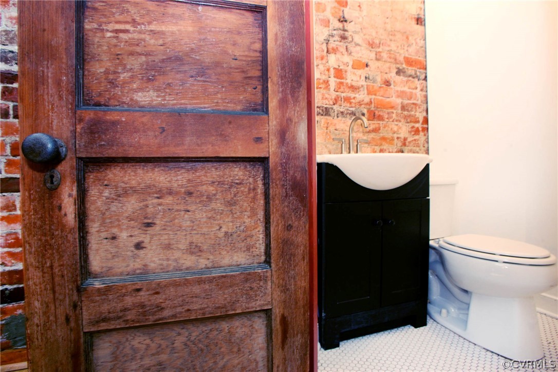411 Brook Road Richmond, VA 23220 - Photo 19 of 26 Fine wood door to custom bath.