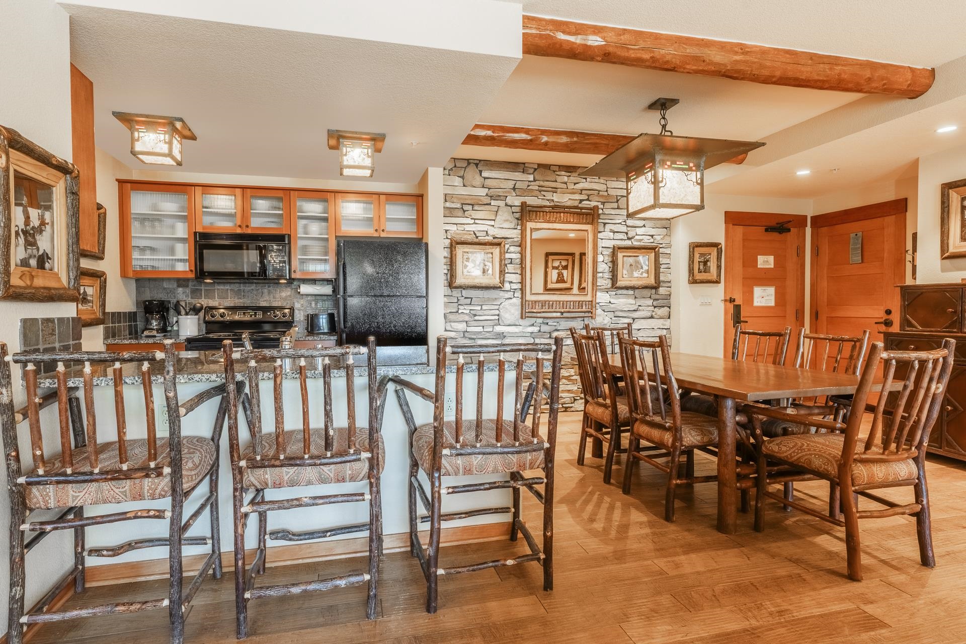 6201 Minaret Road, Unit 2317 Mammoth Lakes, CA 93546 - Photo 11 of 44 a dining area with furniture and outdoor view